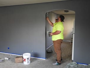 man painting interior